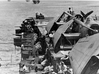 Escort carrier USS Sangamon (CVE-26) with TBM-1C Avengers of Torpedo Squadron VT-37 pictured spotted on the flight deck in 1944