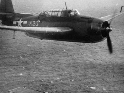 TBF-1 Avenger A20 flies over of USS Saginaw Bay June 1944