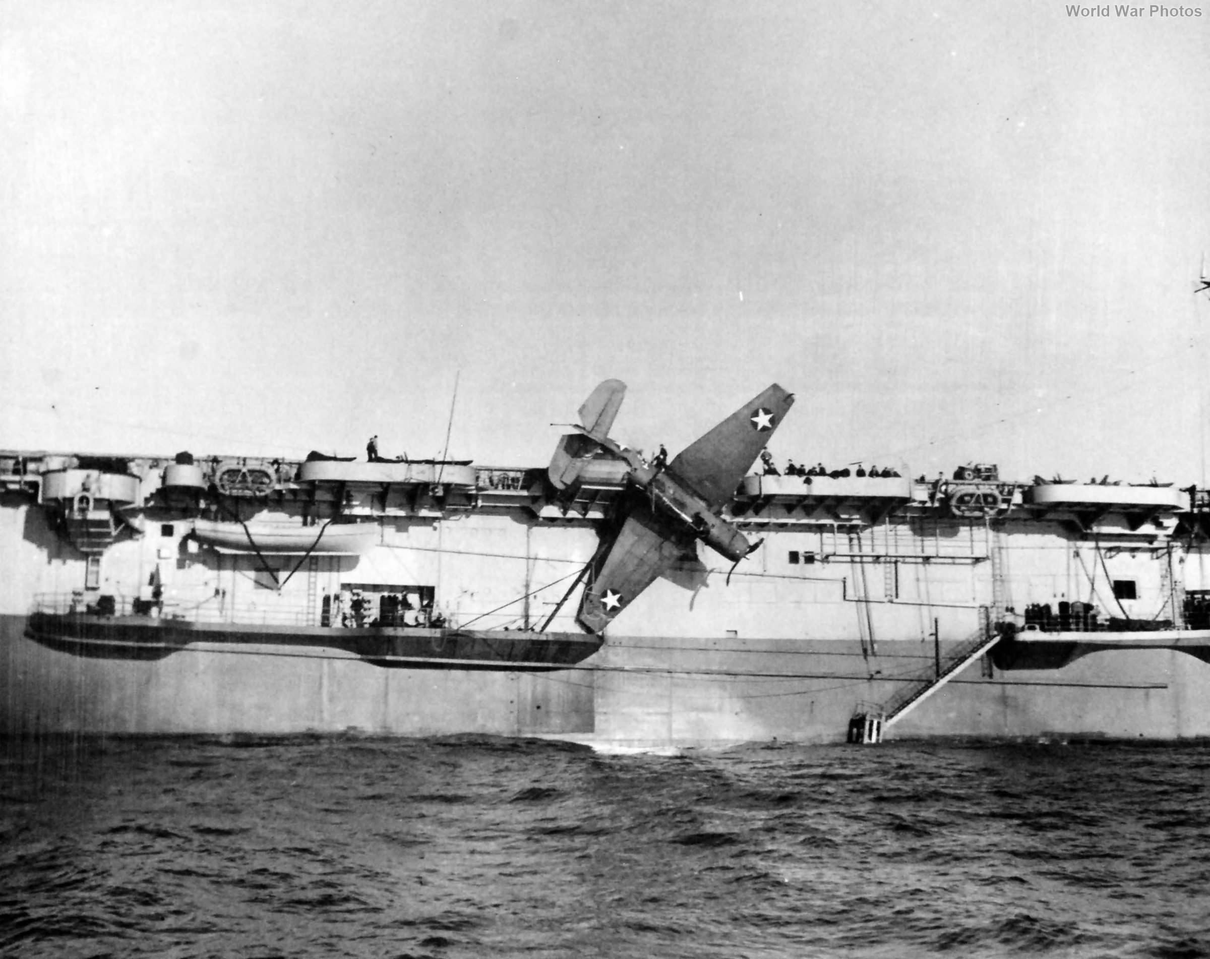 USS Card crash of a TBF over the side 9 August 1943