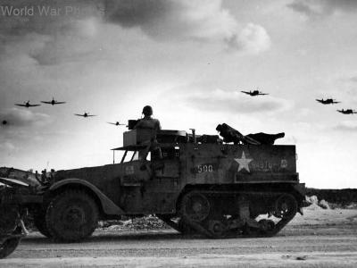 Thunderbolts of the 318th FG over M2A1 Okinawa 1945