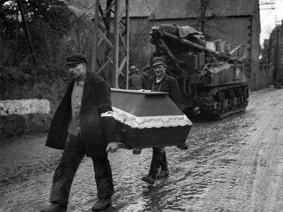 M32 ARV and 3rd Army Troops Pass Germans Carrying Coffin near Coblenz 1945