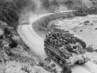 29th Marines hitch ride on M7 moving along a coastal road near Ghuta Village Okinawa