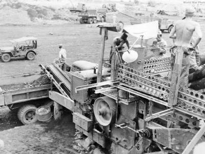 Engineers crush rock for airfield on Cape Gloucester