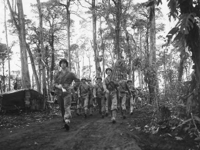 Marine Division band salutes comrades on Cape Gloucester