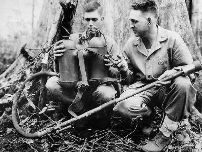 Marines inspect Japanese Type 93 flamethrower on Cape Gloucester