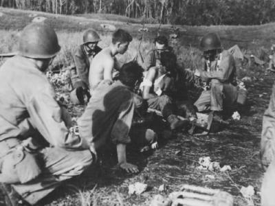 Marine Chaplain Help Wounded In Jungle Guadalcanal