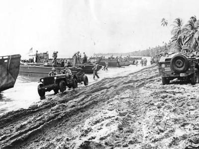 Marines Jeeps and landing barges on Guadalcanal Beach 1942