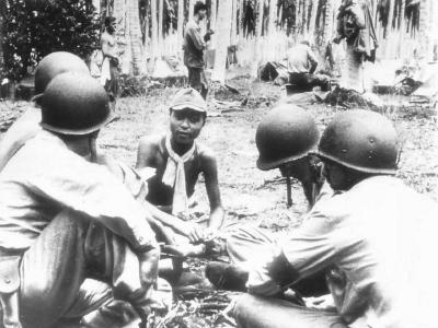 US Officers Question Japanese Prisoner on Guadalcanal 1942