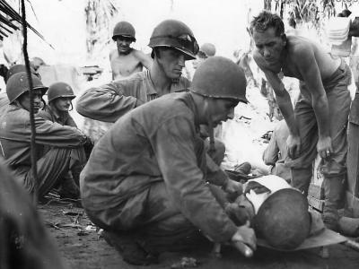 Doctors treat wounded Marines at front line aid station on Guam