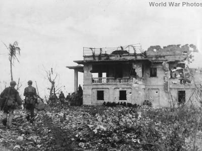 Soldiers move into bomb wrecked mansion on Guam