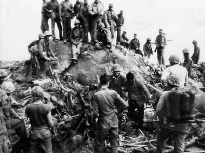 3rd Division Marine with Japanese prisoner on Iwo Jima