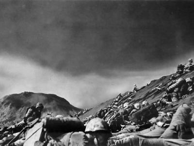 5th Division Marines under fire on Iwo Jima Red Beach No. 1 February 19, 1945