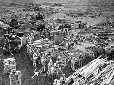Iwo Jima dozers amphibious vehicles beach scene
