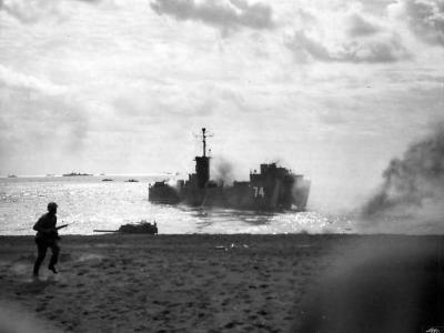 smoke rises from USS LSM-74 after direct hit off Iwo Jima Feb 19 1945