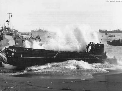 LCM PA-46 from USS Knot battered by surf on Beach of Iwo Jima
