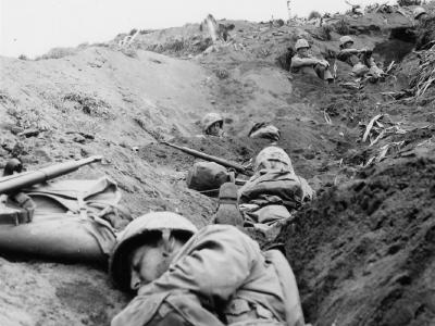 Marines dug In on Iwo Jima under mortar fire 22 February 1945