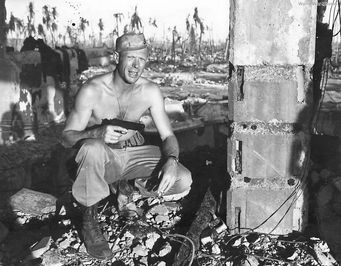 4th Division Marine Lt Willis amid ruins on Namur Island