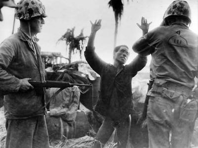Japanese soldier surrenders to Marines on Namur