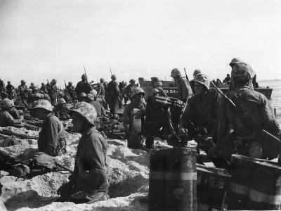 Marines unload equipment on Namur Beach