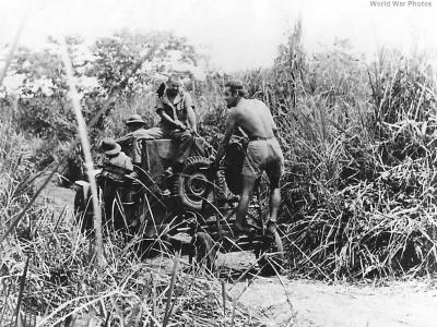 US troops using Jeep to lay cable in New Guinea
