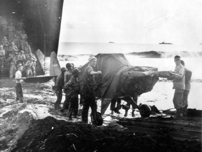 Unloading L-4 on Wakde 1944