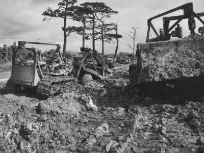 1878th Aviation Engineers Use Bulldozers to Build Road on Okinawa June 1945