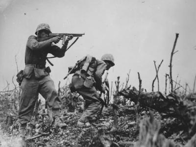 1945 Okinawa1st Div. Marine firing tommy gun