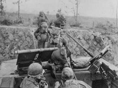 LVT Amtrac amphibious lands 96th infantry division troops Okinawa 1945