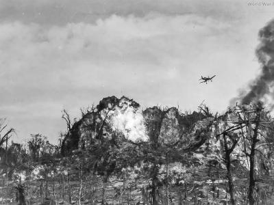 Marine F4U making a napalm run against Japanese defenses on Peleliu in late September 1944 4