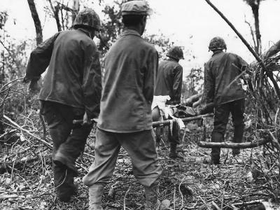 Marine Stretcher Bearers Evacuate Wounded Comrade