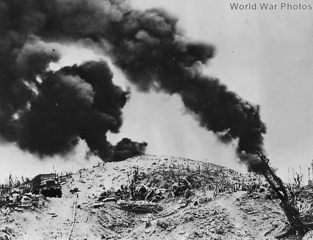 38th Division pipes oil into Japanese hideouts on Caballo Island