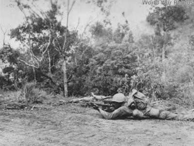 Firing at Japanese sniper 1945, Luzon