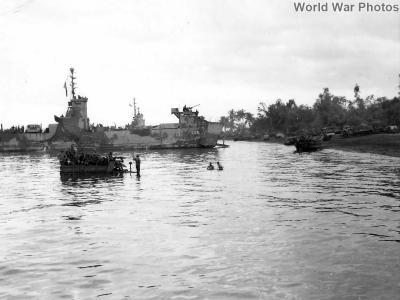 USS LSM-258 unloads troops equipment on Ormoc Beach