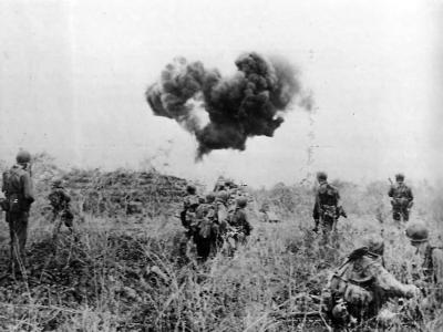 Soldier Blasts Japanese pillbox with Flamethrower on Saipan