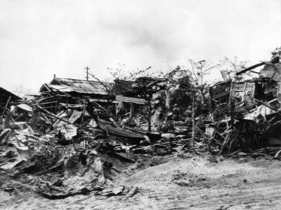 Wrecked bombed ruins of Charin Kanoa on Saipan 26 June 1944