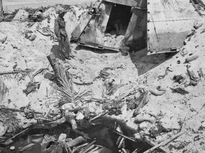 Dead Japanese soldiers and destroyed steel-pillbox