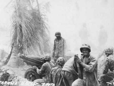 Marine 75 mm howitzer in action Tarawa