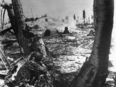 Marine firing on Japanese pillbox on Tarawa