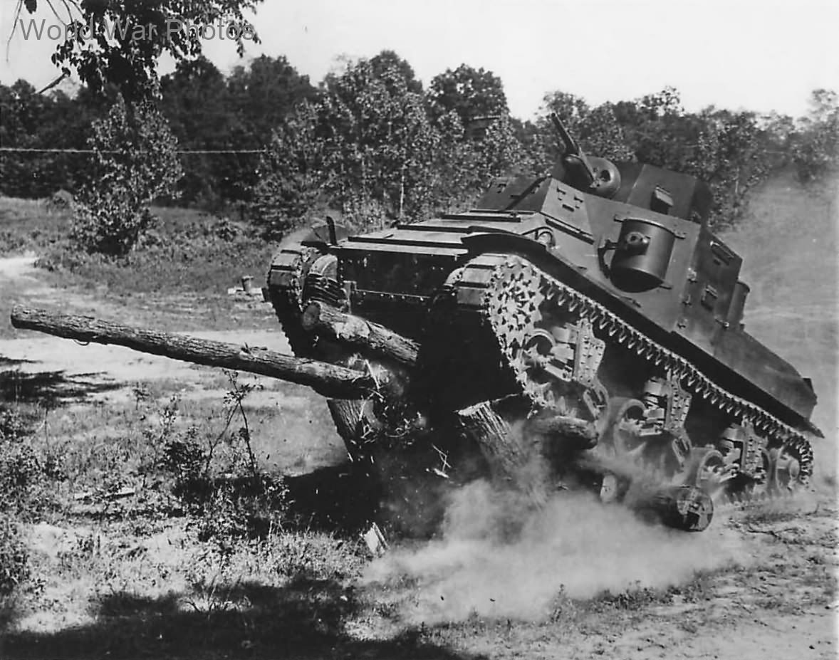 1st Armored Division M2A1 crushes a road block at Fort Knox 1941 2