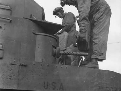 Crew from 2nd Armored Division, 67th Regiment refueling M2A1 1941
