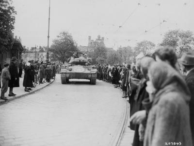M24 Chaffee from 20th Armored Division enters Munich, April 1945