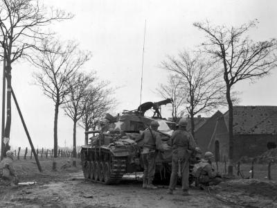 35th Infantry Division clearing Lintfort, Germany with M24 tank support