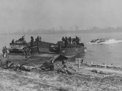 LCM(3) off-loads an M24 Chaffee during the Operation Plunder, March 1945