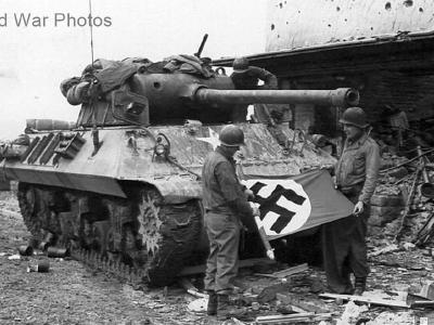 M36 destroyer crew with a German swastika flag