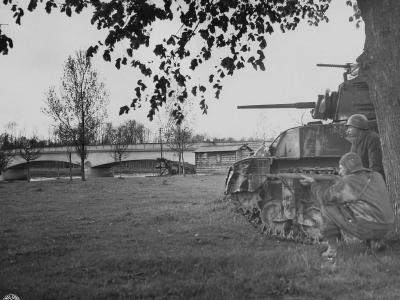 M5A1 Stuart tank and GI with sniper Rifle in ETO, 1944