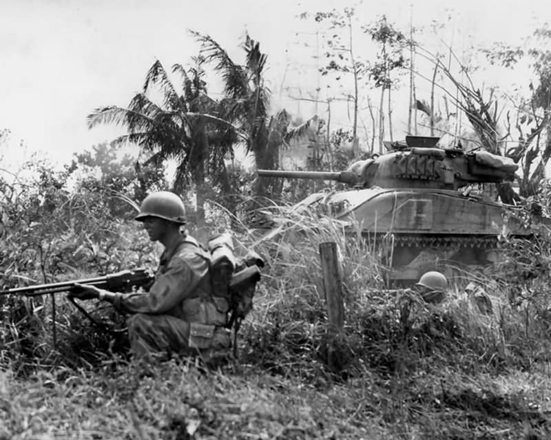 37th Infantry Division BAR Gunner and M4 Sherman Dozer with composite hull of the 775th Tank Battalion on Luzon 1945