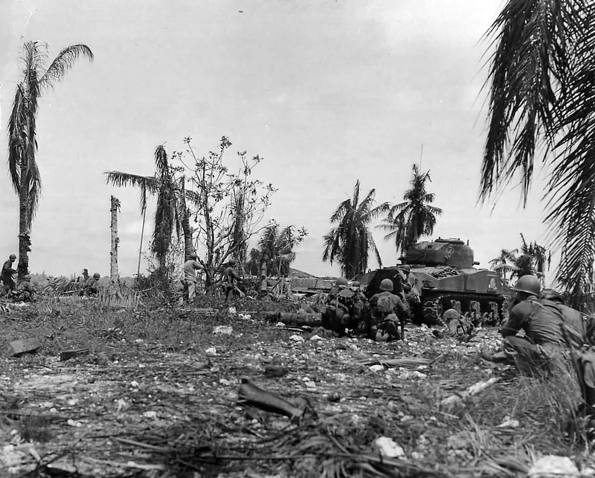 M4 Sherman and troops Advance on Japanese Pillbox at Orote Point Guam