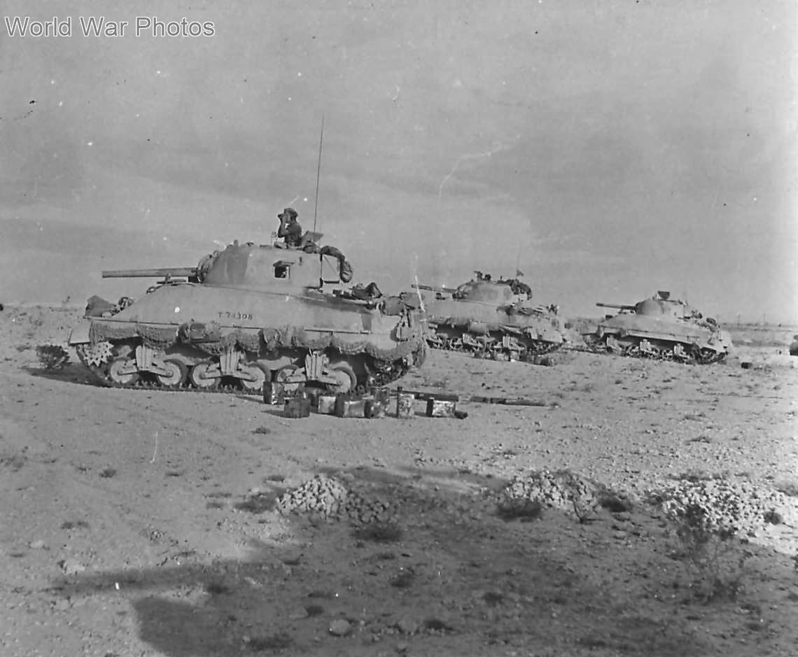 British Troops in Shermans round up enemy troops in Libya 1943