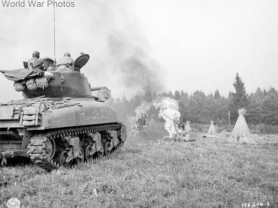 M4A1 Sherman blasts haystank in Belgium 9 September 1944