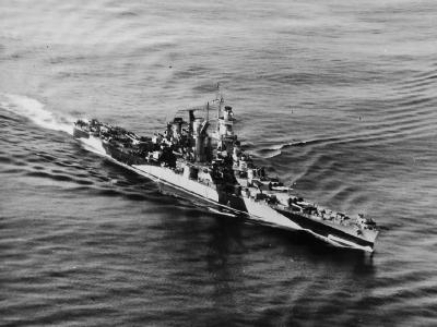 Cruiser USS Alaska CB-1 in camouflage aerial view